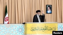 Iran's Supreme Leader Ayatollah Ali Khamenei waves during Friday prayers, in Tehran, Iran, Oct. 4, 2024. (Office of the Iranian Supreme Leader/WANA/Handout via Reuters)