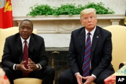 President Donald Trump sits with Kenyan President Uhuru Kenyatta in the White House, Aug. 27, 2018.