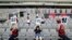 Mannequins are placed in spectator seats to cheer South Korea's football club FC Seoul team during a match against Gwangju FC, which is held without fans due to the coronavirus disease (COVID-19) outbreak, in Seoul, May 17, 2020.