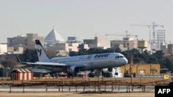 FILE - An Airbus A321 airliner arrives at the Mehrabad international airport during the delivery of the first batch of planes to the Iranian state airline Iran Air in the capital Tehran on Jan. 12, 2017.