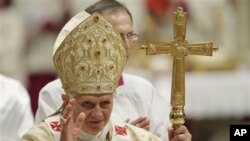 Pope Benedict XVI celebrates Christmas Mass in St. Peter's Basilica at the Vatican, Friday, Dec. 24, 2010. (AP Photo/Andrew Medichini)