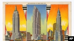  This image provided by the Museum of the City of New York shows a postcard featuring the Empire State Building, from left, the RCA Building, and the Chrysler Building. (Museum of the City of New York via AP)