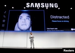 Arvin Baalu, vice president of product management at Harman International, talks about the Samsung Digital Cockpit during a Samsung news conference at the 2019 CES in Las Vegas, Jan. 7, 2019.