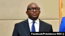 Jean-Michel Sama Lukonde, Ministre wa Yambo ya sika na RDC (G) na président Félix Tshisekedi na Palais de la nation, Kinshasa, 18 mars 2021. (Facebook/Présidence RDC)