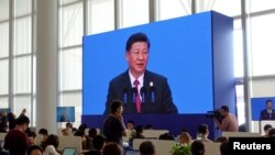 Suasana di media centre "Boao Forum for Asia" saat Presiden China Xi Jinping menyampaikan pidatonya di forum tahunan yang diselenggarakan di Boao, provinsi Hainan, 10 April 2018. (Foto: dok).
