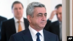 Armenian President Serge Sarkisian enters a hall to meet with Russian President Vladimir Putin in the Novo-Ogaryovo residence outside Moscow, Russia, March 12, 2013. 