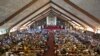 A mass in memory of Nelson Mandela takes place at the Regina Mundi church, which became one of the focal points of the anti-apartheid struggle, in Soweto, Johannesburg, South Africa, Dec. 8, 2013. 