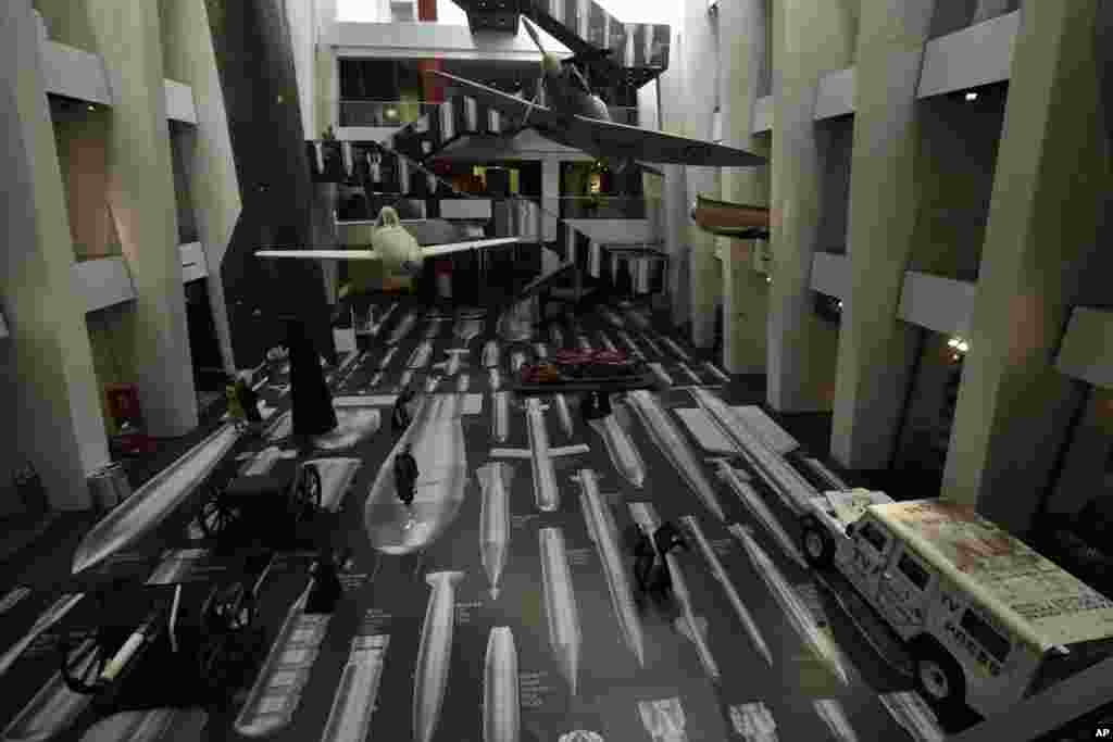 Art installation by Chinese artist Ai Weiwei called&nbsp;&quot;History of Bombs&quot;&nbsp;is seen covering the floor and a staircase in the Atrium at the Imperial War Museum in London.