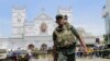 Sri Lankan Army soldiers secure the area around St. Anthony's Shrine after a blast in Colombo, Sri Lanka, Sunday, April 21, 2019. 