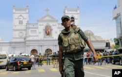 Sri Lankan Army soldiers secure the area around St. Anthony's Shrine after a blast in Colombo, Sri Lanka, Sunday, April 21, 2019.