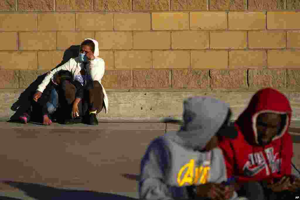 Asylum-seekers wait for news of policy changes at the border in Tijuana, Mexico. After waiting months in Mexico, people seeking asylum in the U.S. are being allowed into the country starting Feb. 19, 2021, as they wait for courts to decide on their cases.