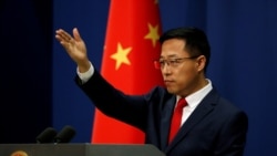 FILE - Chinese Foreign Ministry spokesman Zhao Lijian attends a news conference in Beijing, China Sept. 10, 2020.