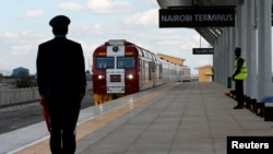 FILE - A train launched to operate on the Standard Gauge Railway (SGR) line constructed by the China Road and Bridge Corporation (CRBC) and financed by Chinese government arrives at the Nairobi Terminus on the outskirts of Kenya's capital Nairobi, May 31, 2017. 