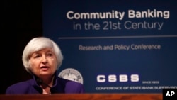 Federal Reserve Chair Janet Yellen delivers opening remarks during a community banking conference, Oct. 4, 2017, at the Federal Reserve Bank of St. Louis. 