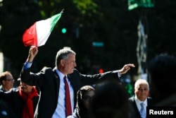 FILE - New York Mayor Bill de Blasio takes part in the 72nd Annual Columbus Day Parade in New York, Oct. 10, 2016.