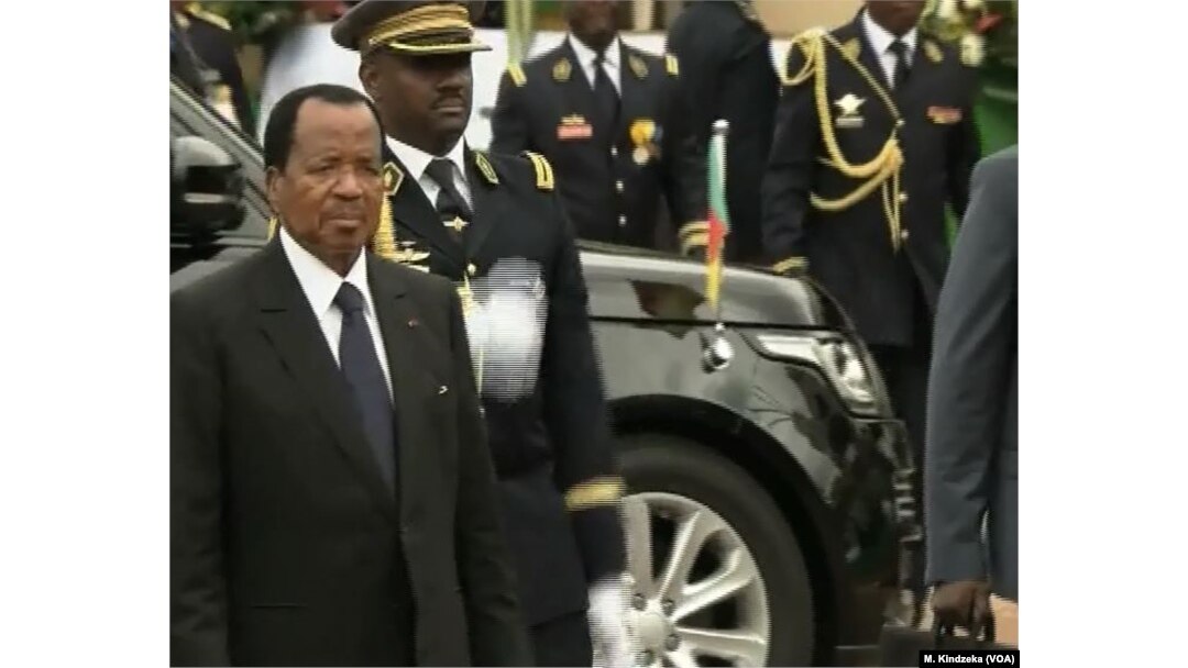 FILE - Cameroon President Paul Biya arrives at the May 20 Boulevard for National Day celebrations, in the Yaounde, Cameroon, May 20, 2018.