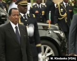 FILE - Cameroon President Paul Biya arrives at the Boulevard for National Day celebrations, in the Yaounde, Cameroon, May 20, 2018.