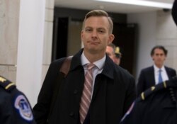 David Holmes, a career diplomat and the political counselor at the U.S. Embassy in Ukaine leaves Capitol Hill, Nov. 15, 2019, in Washington, after a deposition before congressional lawmakers as part of the House impeachment inquiry.