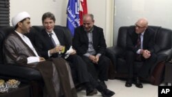 U.S. Assistant Secretary of State for Democracy, Human Rights and Labor Tom Malinowski (2nd L), visits with Sheikh Ali Salman, head of Wifaq National Islamic Society (L), former member of the Bahraini parliament, Abdul Jalil Khalil (2nd R), Timothy J. Pou