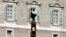 Pope Francis is seen in the window of the Apostolic Palace in Saint Peter's Square at the Vatican Jan. 1, 2014.