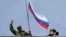 Російський прапор над штаб-квартирою ВМС України в Севастополі