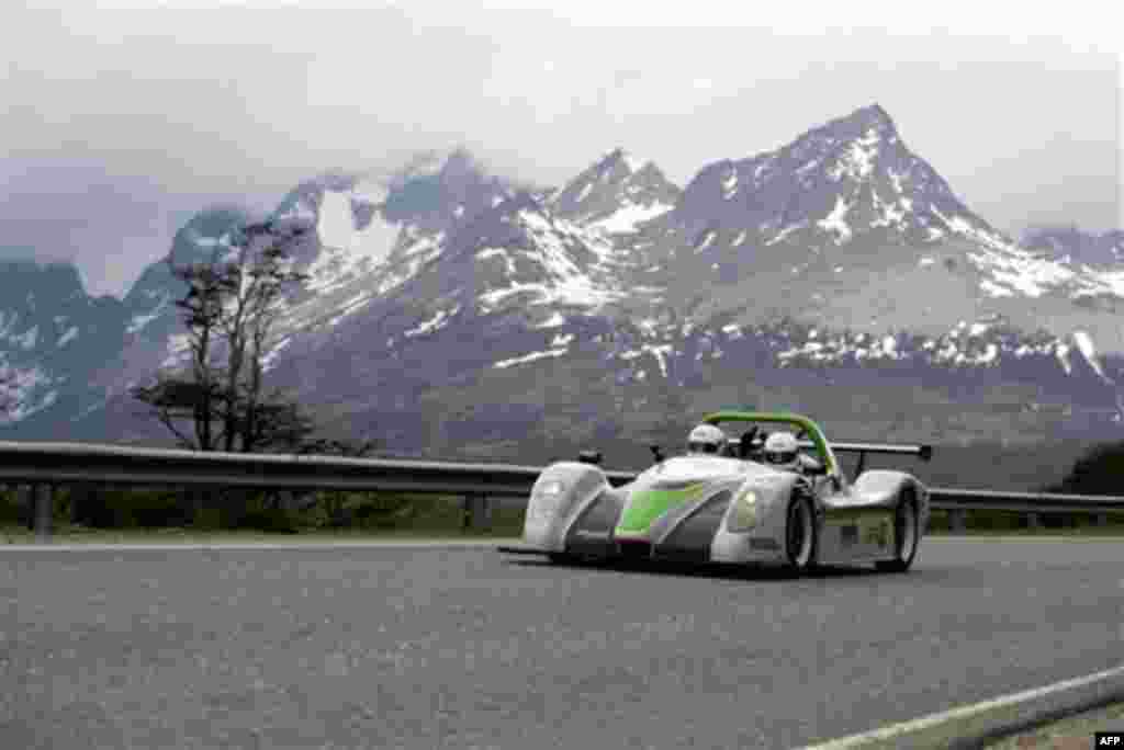 Alexander Schey and Toby Schulz, of the British eco-adventure Racing Green Endurance (RGE) team, drive the SRZero electric sports car as they arrive to Ushuaia, Argentina, Tuesday Nov. 16, 2010. The SRZero became the first electric car to travel from Ala