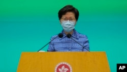 Hong Kong Chief Executive Carrie Lam listens to reporters' questions during a press conference in Hong Kong, May 26, 2020.