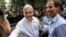 FILE - Chilean former President Sebastian Pinera (L) and Chilean right-wing lawyer and Santiago's mayoral candidate Felipe Alessandri greet supporters during Municipal elections in Santiago, Oct. 23, 2016.