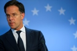 FILE - Dutch Prime Minister Mark Rutte speaks at the end of an EU summit in Brussels, Feb. 21, 2020.