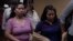 Evelyn Beatriz Hernandez, right, leaves the court accompanied by family during her second trial, in Ciudad Delgado on the outskirts of San Salvador, El Salvador, July 15, 2019.