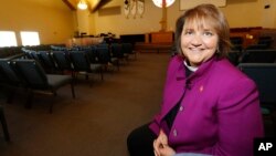 Bishop Karen Oliveto in the sanctuary of a United Methodist Church near her office in Highlands Ranch, Colo., April 19, 2017. On Tuesday, the highest court in the United Methodist Church considered whether to invalidate the election of the denomination’s first openly gay bishop, Oliveto, amid a struggle to avoid schism over the Bible and same-sex relationships.