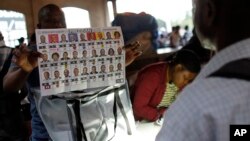 Electoral workers count ballots at a polling station in Port-au-Prince, Haiti, Nov. 20, 2016. 