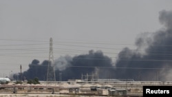 Smoke is seen following a fire at Aramco facility in the eastern city of Abqaiq, Saudi Arabia, Sept. 14, 2019. 