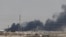 Smoke is seen following a fire at Aramco facility in the eastern city of Abqaiq, Saudi Arabia, Sept. 14, 2019. 