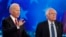 FILE - From left, Democratic presidential candidates, Sen. Bernie Sanders, I-Vt., former Vice President Joe Biden, talk before a Democratic presidential primary debate, Feb. 25, 2020.