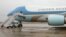 FILE - Air Force One, the plane of U.S. presidents, sits ready for boarding on the tarmac at Joint Base Andrews in Maryland, near Washington, D.C., Dec. 6, 2016. 
