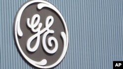 FILE - The General Electric logo is seen at a plant in Belfort, eastern France, in June 2014.