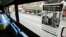 FILE - A poster entitled "It All Started On A Bus," is pasted above the front seat of a New York City bus to honor Rosa Parks in New York, Dec. 1, 2005. 