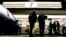 U.S. Immigration and Customs Enforcement agents serve an employment audit notice at a 7-Eleven convenience store, Jan. 10, 2018, in Los Angeles.