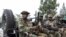 FILE PHOTO: M23 rebels escort FDLR to Rwandan border for repatriation after capture in Goma