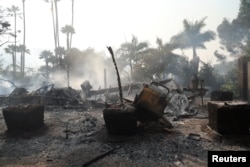 Izgorjele građevinske strukture u Malibuu, u Kaliforniji (Foto: REUTERS/Mario Anzuoni)