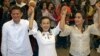 Newy proclaimed Philippine senators, from left: Sen. Francis Joseph Escudero, Sen. Grace Poe and Sen. Loren Legarda raise hands at the National Board Canvassing Center in suburban Pasay, south of Manila, May 16, 2013. 