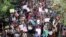 Thousands of students join in a protest over recent traffic accidents that killed a boy and a girl, in Dhaka, Bangladesh, Aug. 5, 2018. 