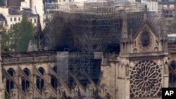នេះ​ជា​ទិដ្ឋភាព​របស់​វិហារ Notre Dame ដែល​ថត​ពី​កំពូល​អគារ Montparnasse កាលពី​ថ្ងទី១៦ ខែមេសា ឆ្នាំ២០១៩ ក្នុង​ក្រុង​ប៉ារីស ប្រទេស​បារាំង។