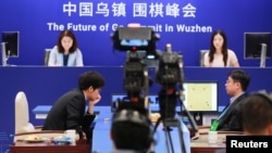 FILE - Chinese Go player Ke Jie reacts during his second match against Google's artificial intelligence program AlphaGo at the Future of Go Summit in Wuzhen, Zhejiang province, China May 25, 2017.