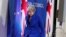 British Prime Minister Theresa May leaves the podium after addressing a media conference at the conclusion of an EU summit in Brussels, April 11, 2019.