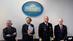 From left, Director of the National Institute of Allergy and Infectious Diseases Dr. Anthony Fauci, White House coronavirus response coordinator Dr. Deborah Birx, Surgeon General Jerome Adams, and FDA Commissioner Dr. Stephen Hahn. 