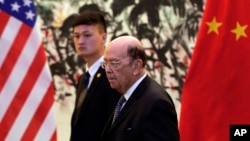 U.S. Commerce Secretary Wilbur Ross arrives to the Diaoyutai State Guesthouse to attend a meeting with Chinese Vice Premier Liu He in Beijing, June 3, 2018. U.S. Commerce Secretary Ross is in Beijing for talks on China's promise to buy more American goods after Washington ratcheted up tensions with a new threat of tariff hikes on Chinese high-tech exports. 