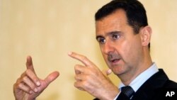 FILE - Syrian President Bashar Assad