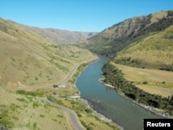 The area around the Cooper's Ferry archaeological site, located along the Salmon River in western Idaho, U.S., is shown in this image released August 29, 2019. (Loren Davis/Oregon State University/Handout via REUTERS)